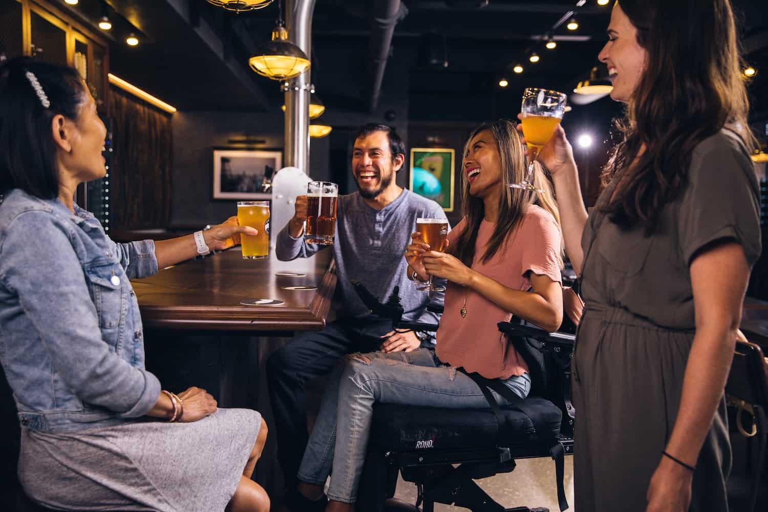friends hanging out in a bar with beer