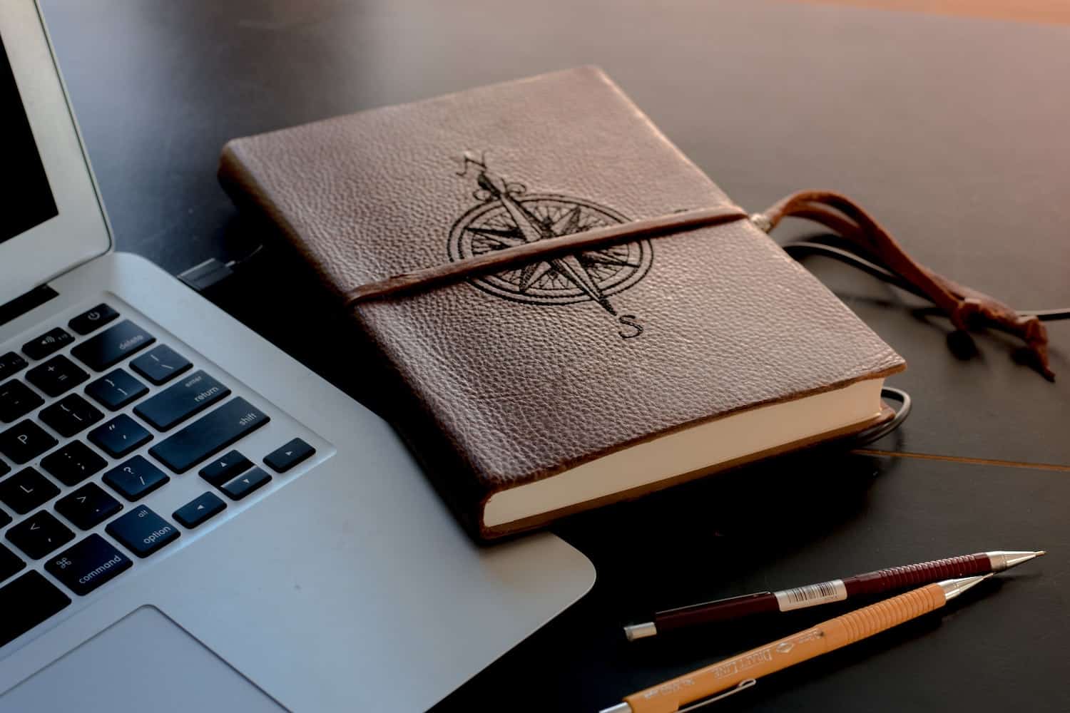 journal with compass on it
